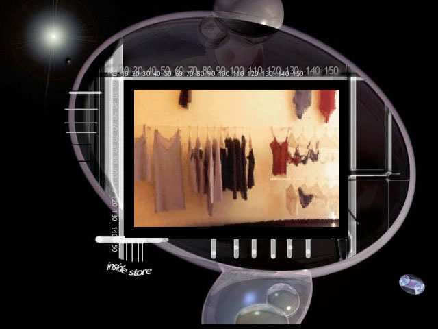 Kristina Ti's website - Locations - Inside Paris store - An image of various shirts and tank tops hanging on a wall, framed within an abstract digital interface against a dark background.
