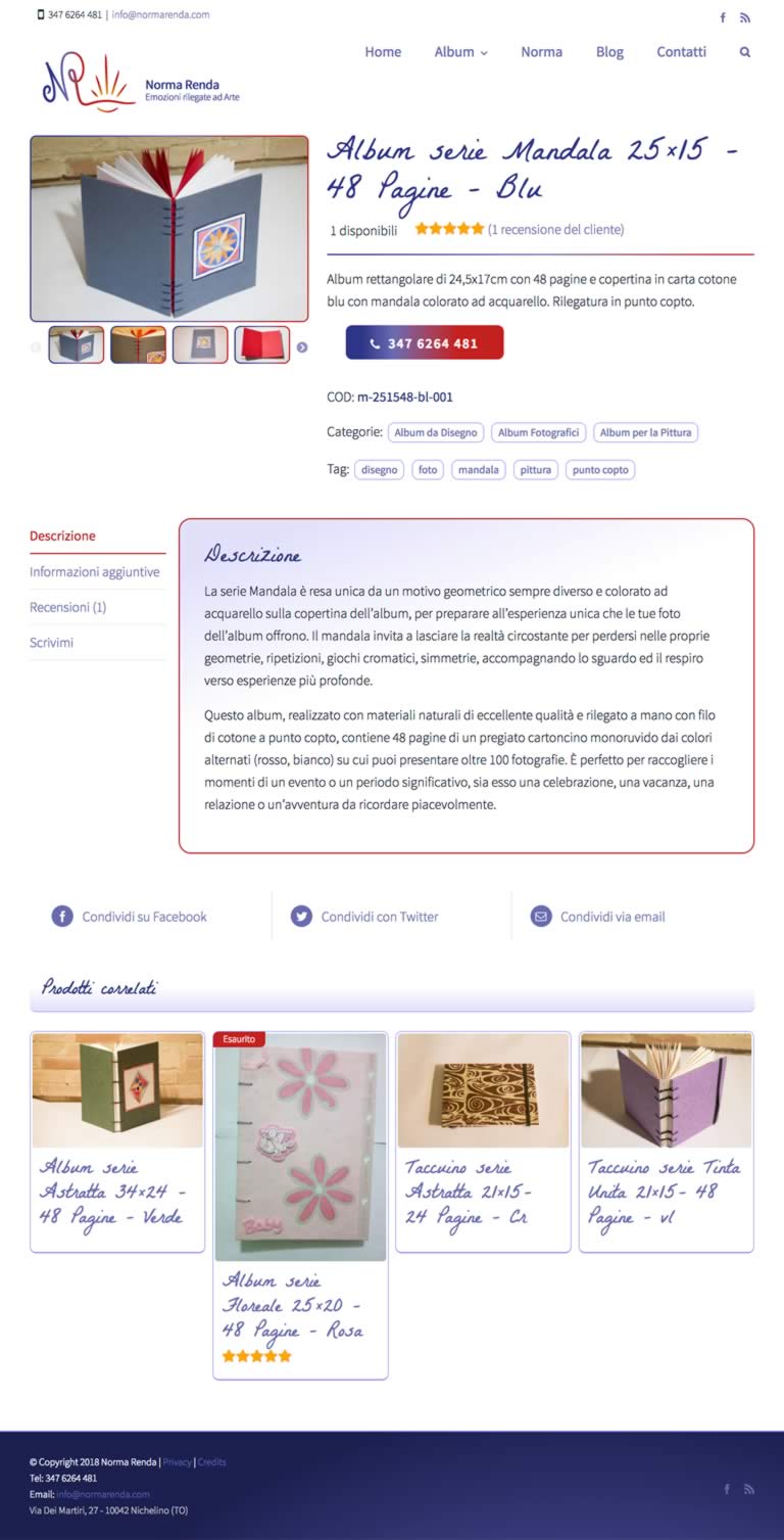 A blue mandala-themed album with 48 pages, featuring a colorful watercolor design on the cover, displayed open on a light background.